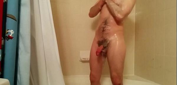  hung guy taking a shower